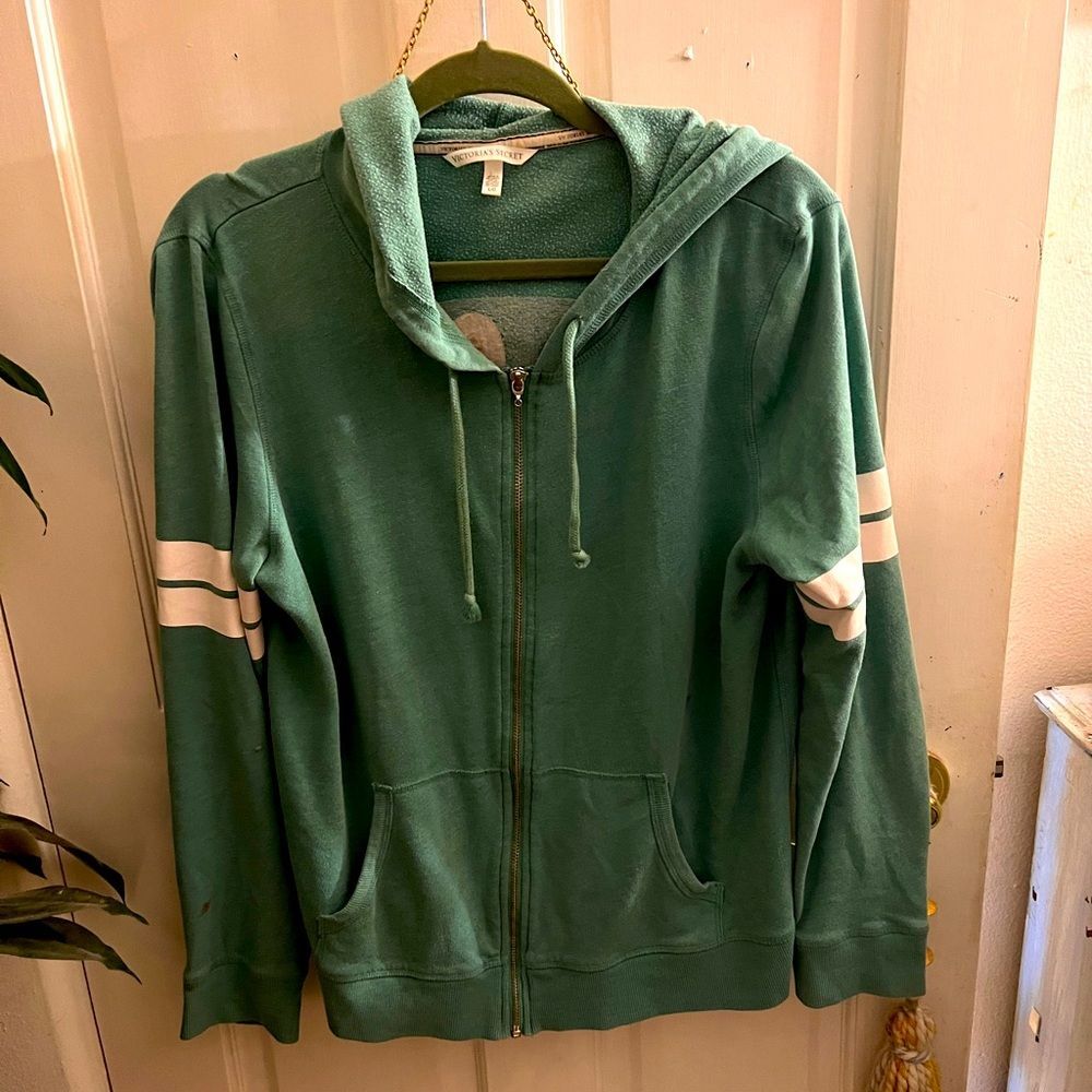 Victoria’s Secret green zip up hoodie with Angel printed on the back